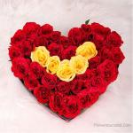 Heart Arrangement With Red and Yellow roses