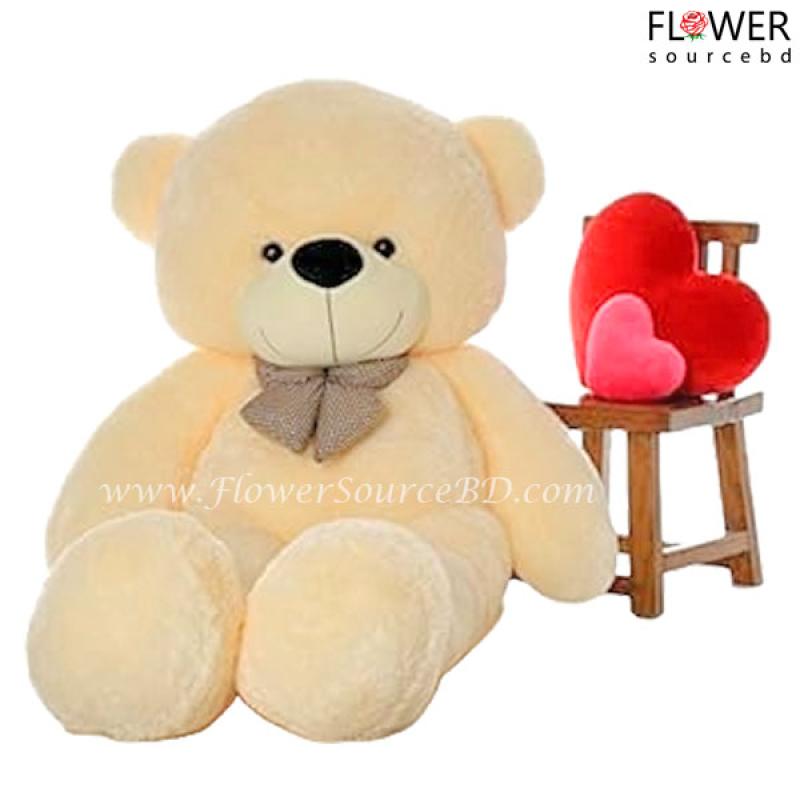Big teddy bear in cream
